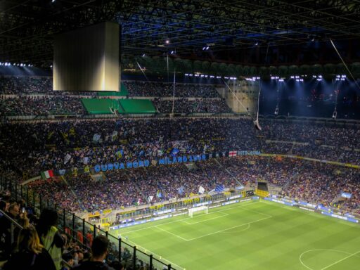 a stadium full of people watching a soccer game